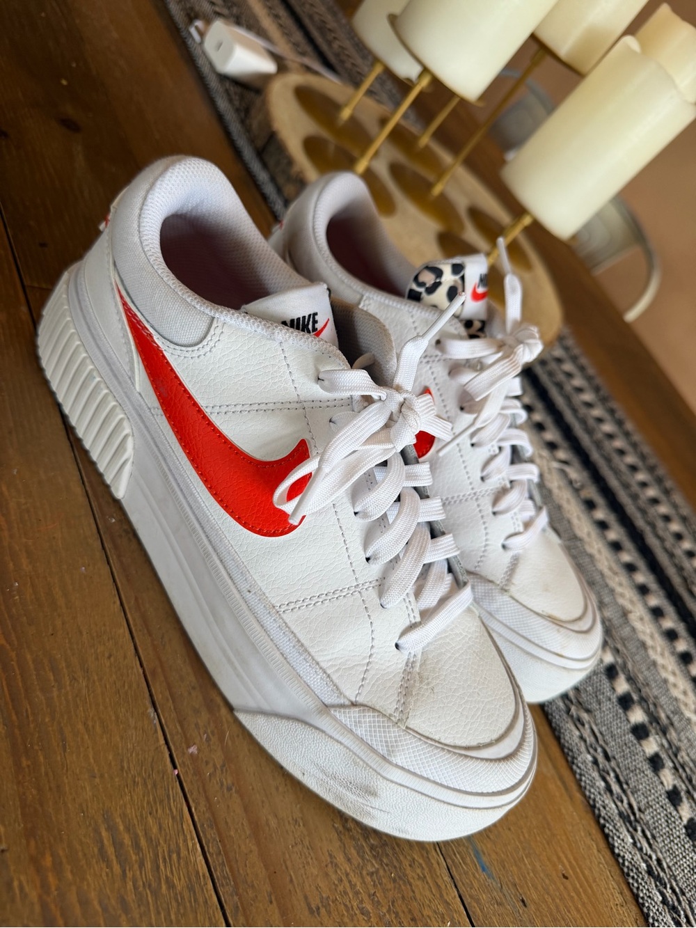 Nike White Low-Top Sneakers with Red Swoosh